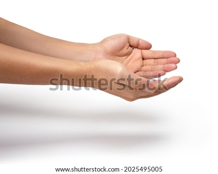 Man hand hold or giving something. Two male hands gesture. Royalty-Free Stock Photo #2025495005