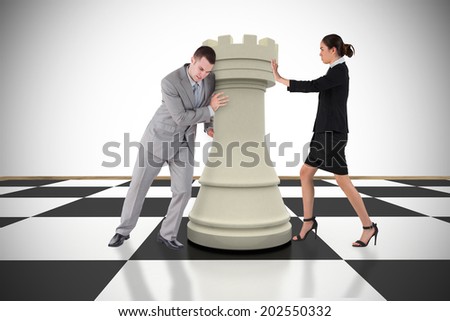 Composite image of business people pushing chess piece against white background with vignette