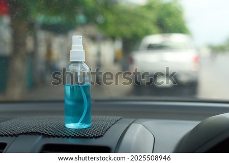Spray alcohol in car protect covid 19