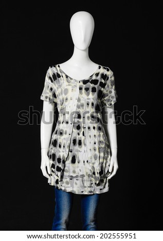 mannequin dressed fashionably and jeans isolated on black