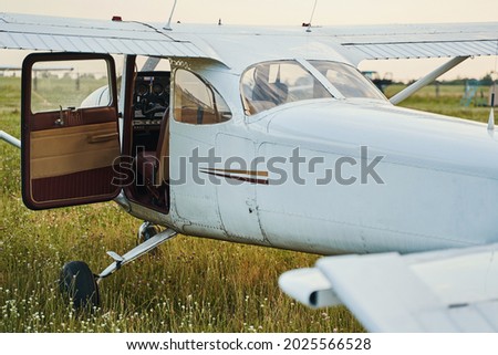 Picture of private plane parked on the airdrome