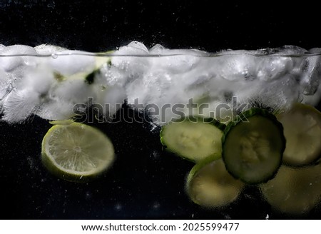 Water drops on ripe sweet fruits and berry. Fresh fruits background with copy space for your text. Vegan and vegetarian concept.
