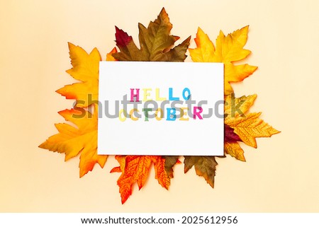 Great season texture with fall mood. Nature september and october background with hand lettering Hello October.