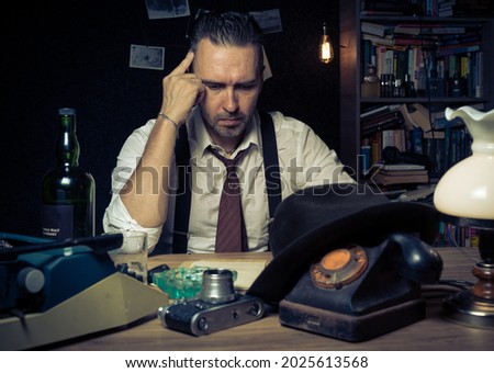 Retro private detective behind the desk, noir cinematic scene Royalty-Free Stock Photo #2025613568