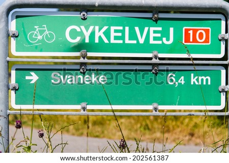 Cycling sign with direction, Bornholm, Denmark