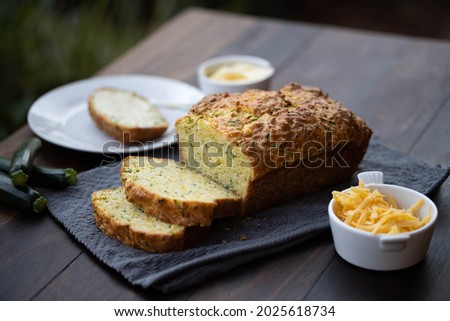 Buttermilk quick loaf with zucchini, chives and cheddar Royalty-Free Stock Photo #2025618734
