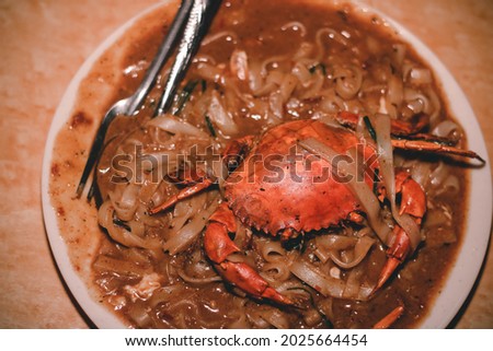 crab nipah char kuey teow with egg, fried over high heat, a favorite food of many Malaysians