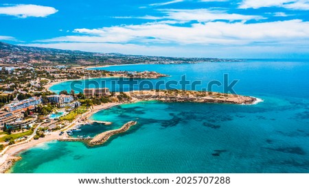 Aerial view of coastline of Cyprus beach.The steep stone cliffs and deep blue sea waves crushing in coves. beautiful turquoise waters of mediterranean. Postcard place, wonderful resort Royalty-Free Stock Photo #2025707288