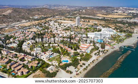 Aerial view of coastline of Cyprus beach.The steep stone cliffs and deep blue sea waves crushing in coves. beautiful turquoise waters of mediterranean. Postcard place, wonderful resort