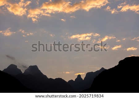 mountain background silhouette with dramatic clouds