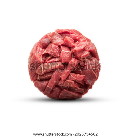 a creepy ball made of raw meat. harming meat food or an unusual ingredient for the Halloween horror holiday. The isolate is bloody, funny and inappropriate