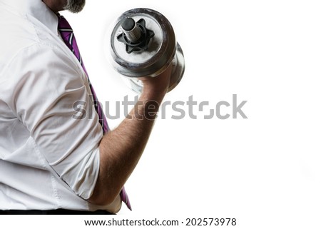Businessman holding a silver dumbbell in the right hand