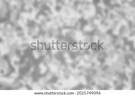 blurred background of white and black striped plastic cloth use as backdrop