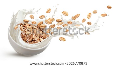 Oat flakes with milk splashes isolated on white background with clipping path Royalty-Free Stock Photo #2025770873