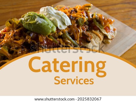 Composition of catering services text over food on wooden table. catering business promotional communication concept digitally generated image.