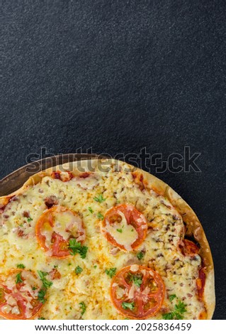 Composition of fresh pizza on gray background. health, leisure and entertainment concept digitally generated image.