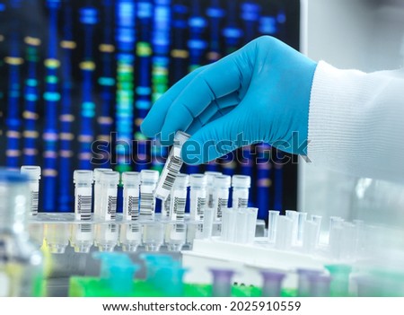 Scientist preparing a DNA sample for testing. Royalty-Free Stock Photo #2025910559