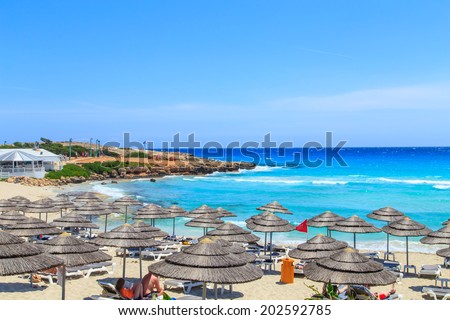A view of a azzure water and Nissi beach in Aiya Napa, Cyprus Royalty-Free Stock Photo #202592785