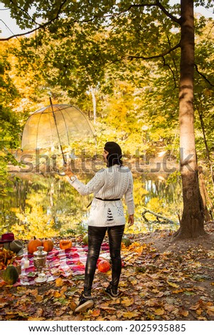 portrait of autumn girl with leaves