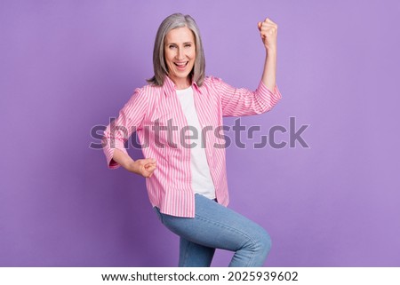 Profile side photo of aged woman happy positive smile rejoice win victory success isolated over violet color background