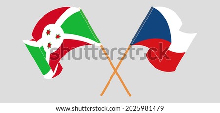 Crossed and waving flags of Burundi and Czech Republic