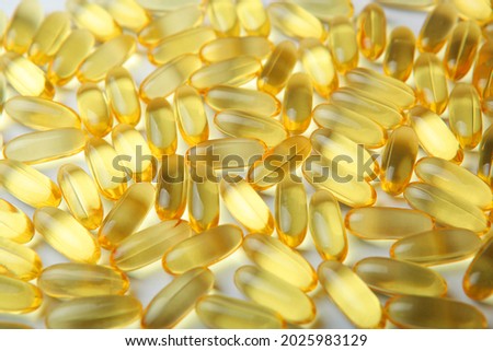 Omega 3 capsules close up. Fish fat. Background 