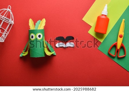 A parrot made of paper. Do it yourself with the children. Detailed step-by-step instructions. Step 7 Cut out the nose.