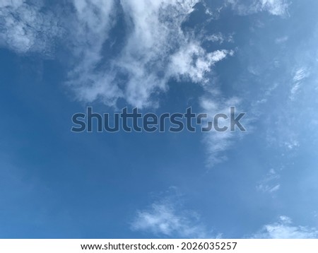 photograph of blue sky and white clouds