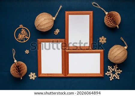 Wooden frames and Christmas decorations . Flat lay. Top view