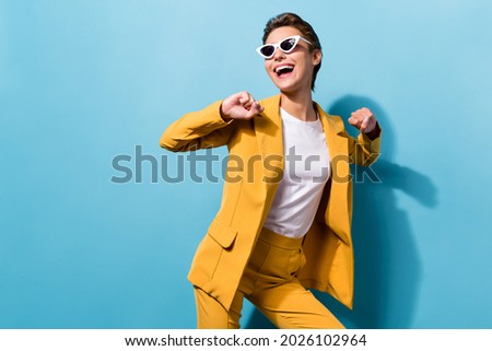 Photo of young cheerful girl happy positive smile have fun dance music isolated over blue color background Royalty-Free Stock Photo #2026102964