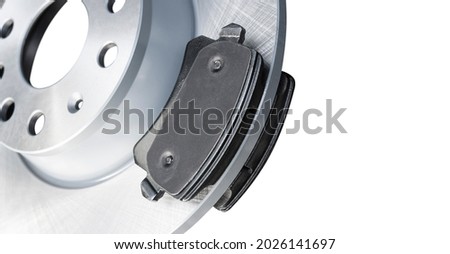 Brake discs and brake pads isolated on white background. Auto parts. Brake disc rotor isolated on white. Braking disk. Car part. Quality spare parts for car service or maintenance	 Royalty-Free Stock Photo #2026141697