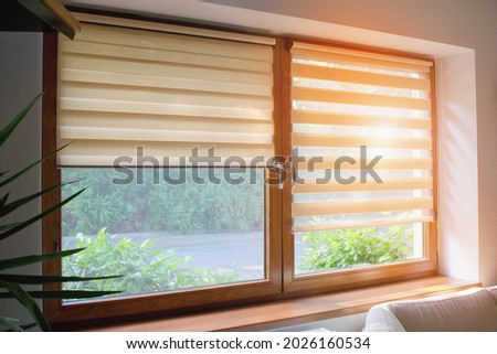 Window roller, duo system day and night.  Cozy home interior. Royalty-Free Stock Photo #2026160534