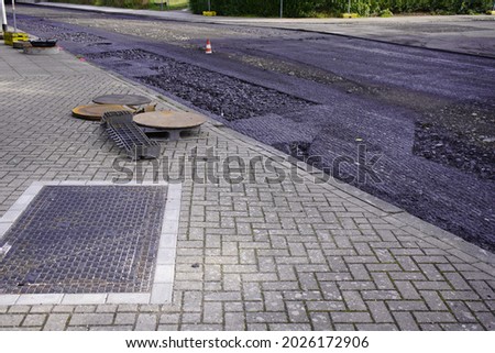 Renewal of the road surface with new asphalt. Location: Immelmannstrasse, Hanover, Germany