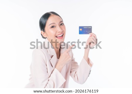 Business Asian woman showing credit card for payment shopping online isolated on white background , paying by credit card online shopping  e-commerce telemarketing concept