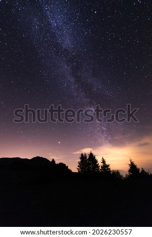 View of the milky way in a clear night sky from a mountain environment