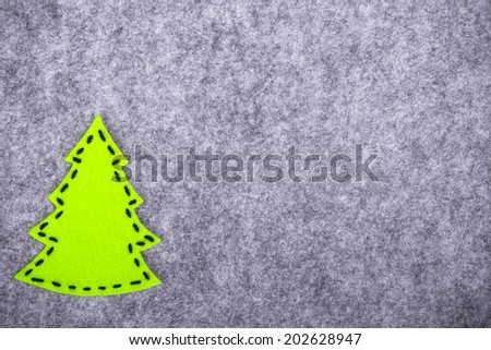 Christmas background with christmas tree felt decorations