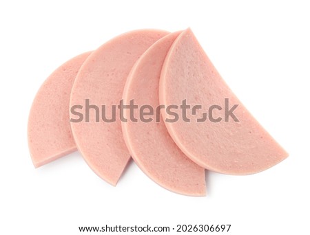 Slices of tasty boiled sausage on white background, top view Royalty-Free Stock Photo #2026306697