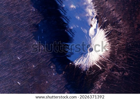 Volcano from space Elements of this image were furnished by NASA. High quality photo