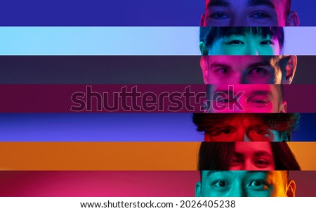 Collage of close-up male and female eyes isolated on colored neon backgorund. Multicolored stripes. Flyer with copy space for ad. Concept of equality, unification of all nations, ages and interests Royalty-Free Stock Photo #2026405238