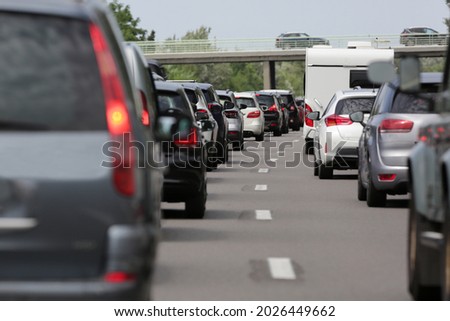 Traffic congestion in the highway for holidays Royalty-Free Stock Photo #2026449662