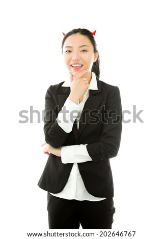 Devil side of a young Asian businesswoman smiling with hand on chin isolated on white background