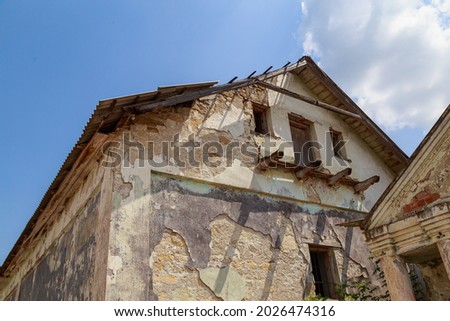 Soviet agricultural building in the village. Urban Architecture. Background with copy space for text. Abandoned objects of the USSR times