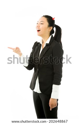 Devil side of a young Asian businesswoman laughing and pointing isolated on white background