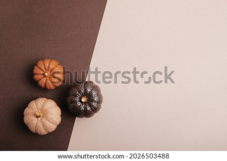 Flat lay with handmade painted gypsum pumpkins and copy space. Autumn holidays card mockup