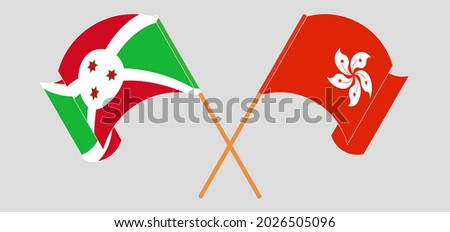 Crossed and waving flags of Burundi and Hong Kong