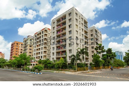 Residential multistory apartment buildings with city road at Rajarhat area of Kolkata India  Royalty-Free Stock Photo #2026601903