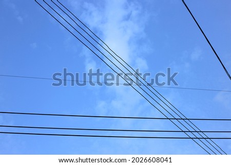 Power lines or communication cables in the sky