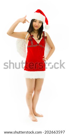 Asian young woman wearing Santa costume dressed up as an angel pointing herself isolated on white background