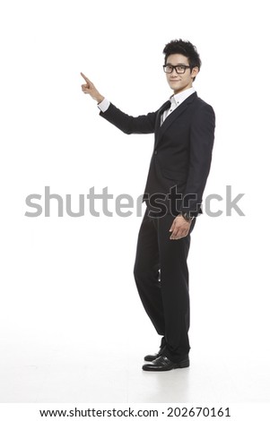 Businessman standing on white wallpaper