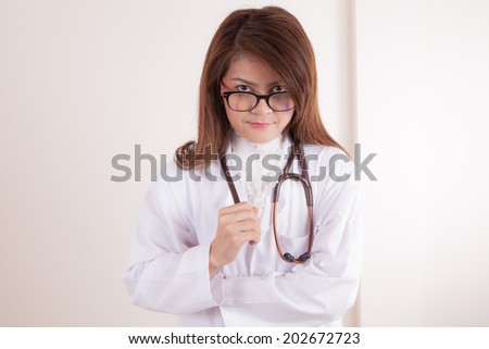 Female doctor in a white medical dressing gown